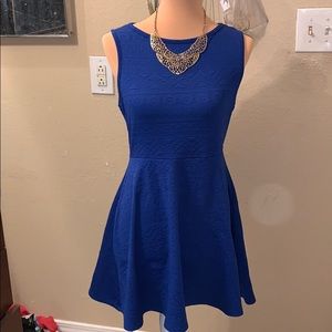 Bright blue fit & flare dress w/ cut out back